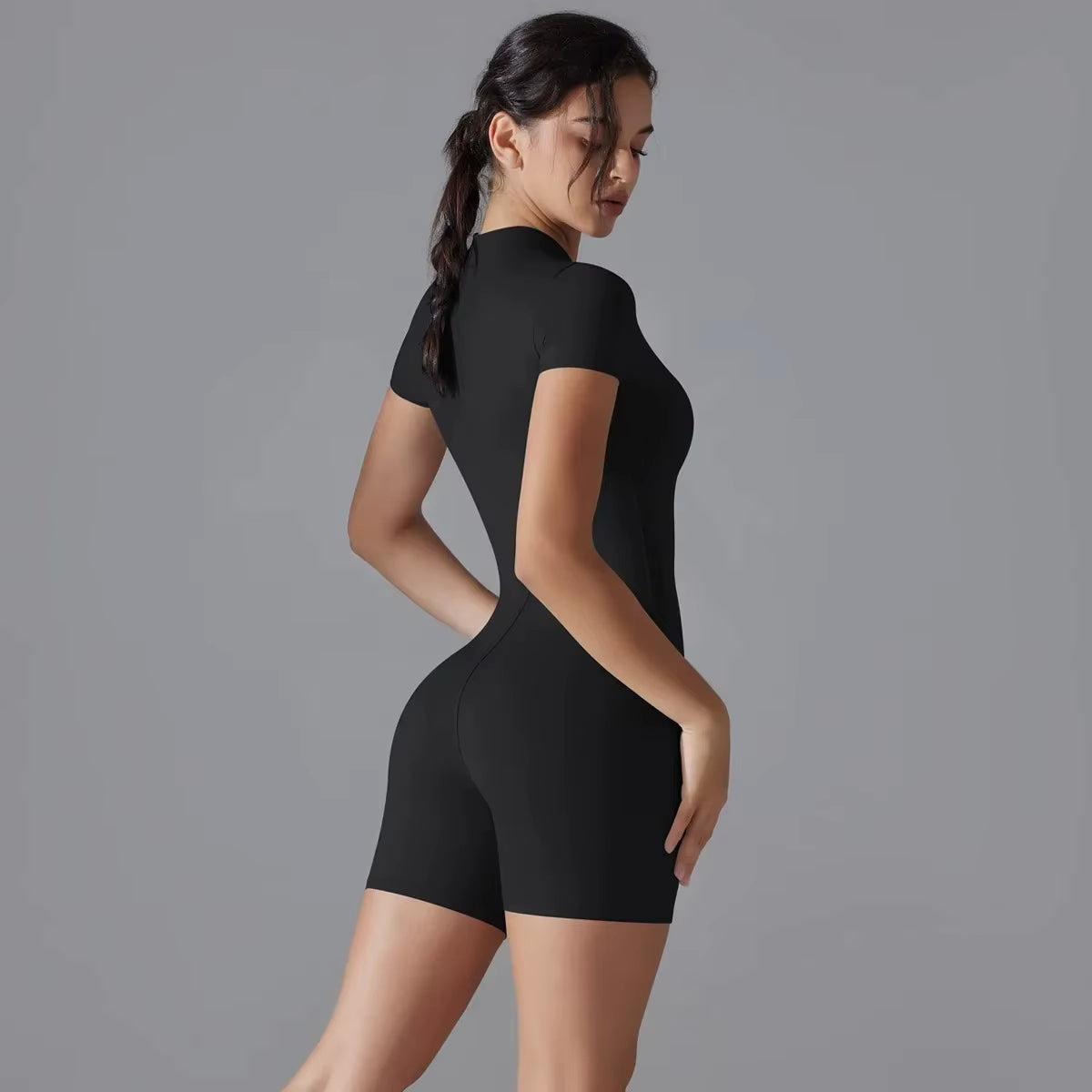 Mono Essential Sculpt de manga corta con cremallera (largo corto)